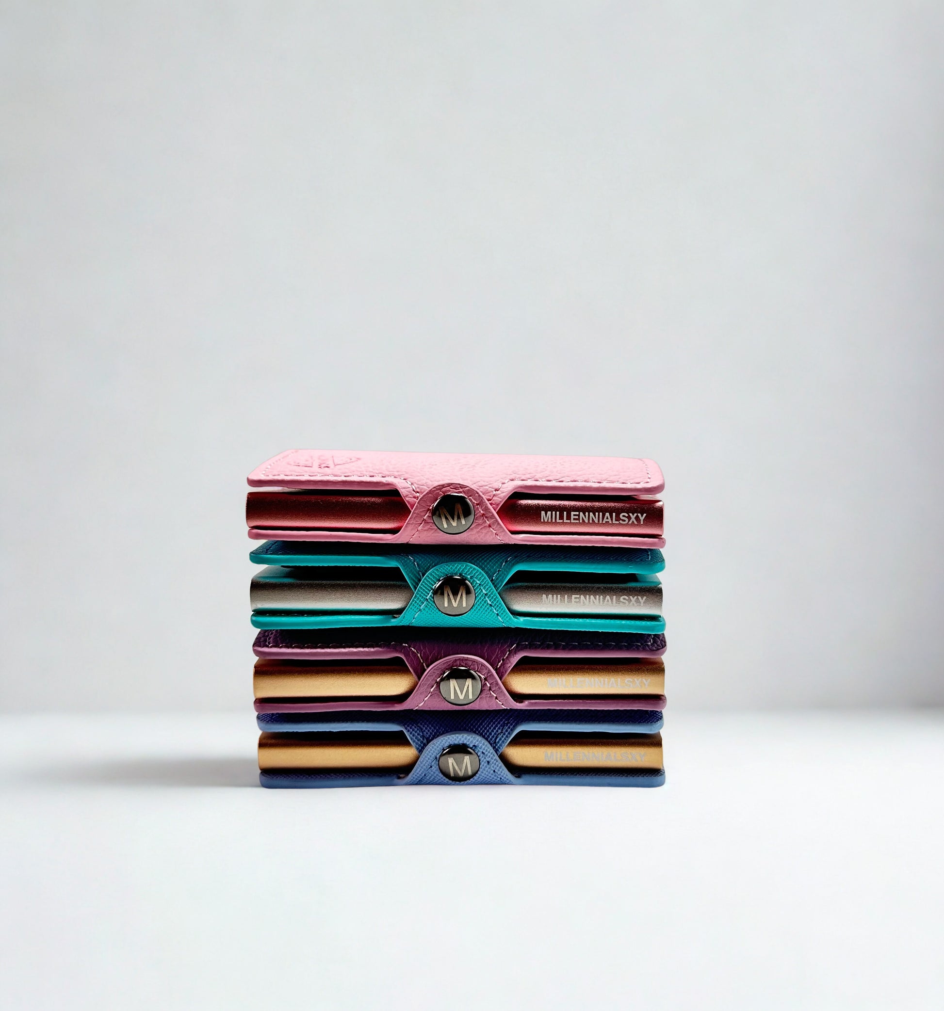 Tarjeteros acostados tonos pastel rosado, verde, morado y azul