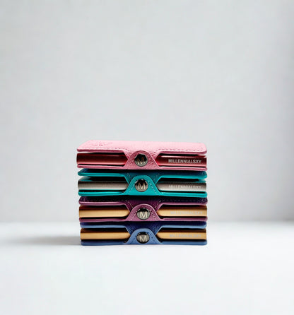 Tarjeteros acostados tonos pastel rosado, verde, morado y azul
